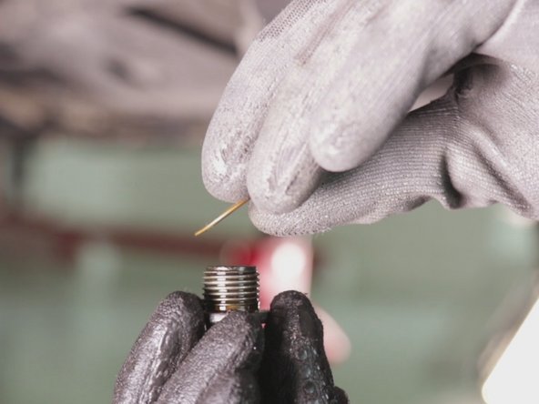 
Insert the drain gasket onto the sump plug
