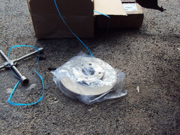 Mettez le nouveau disque en place.