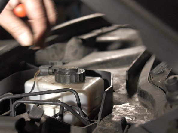 Décaler le guide pour dégager la baie de pare-brise