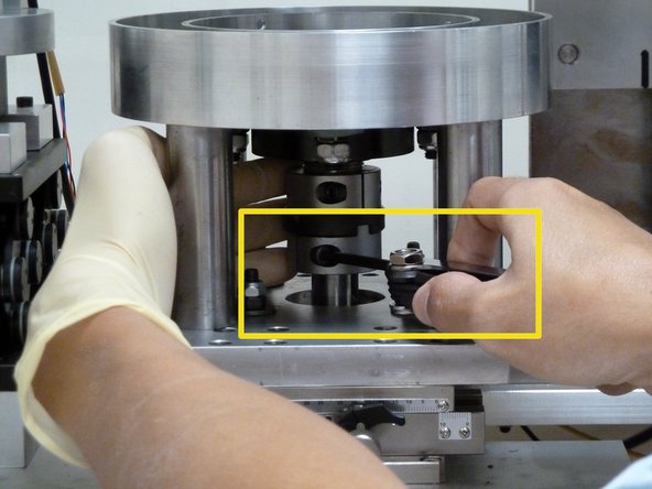 Align the coupling bottom piece with the plastic middle piece