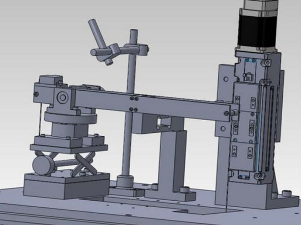 Place increasing loads on the hanging mass to obtain a relationship between the mass and voltage output.