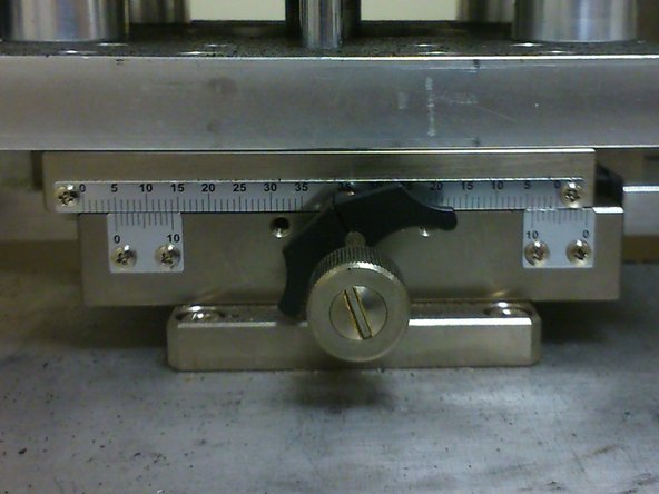 Use a torque wrench to turn the x-translation stage's knob to a suitable value.