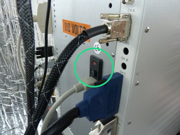 Switch off CETR Wear Tester (Switch, as shown, is at the back of the CETR Wear Tester