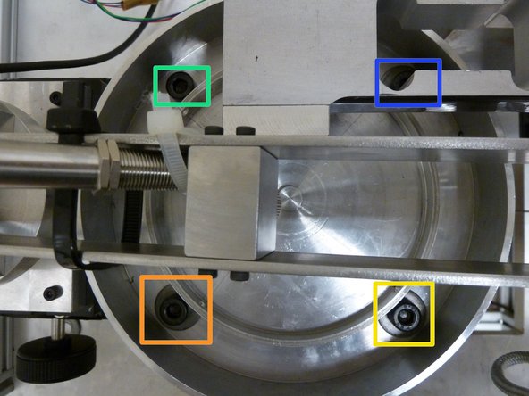 Hence, we need to tighten the upper left screw to tilt the angle back and make the coupling more aligned.