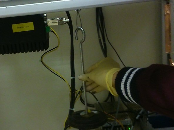 Using different masses and plasticine, load the hanging mass based on the normal load required.