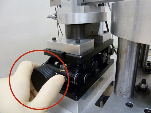 Now, adjust the lab-jack knob, while taking note of the inclinometer reading (in deg) on the 'Production Test' page, to as close to 0 degree as possible