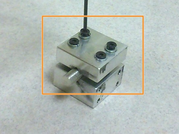 Use an allen key to tighten the remaining two screws.