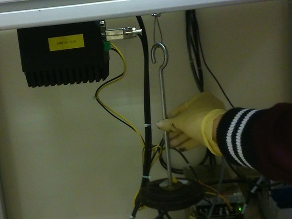 Using different masses and plasticine, load the hanging mass based on the normal load required.