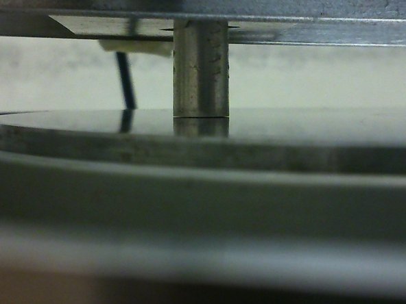 Ensure that the beam is as horizontal as possible by adjusting the height of the pivot.