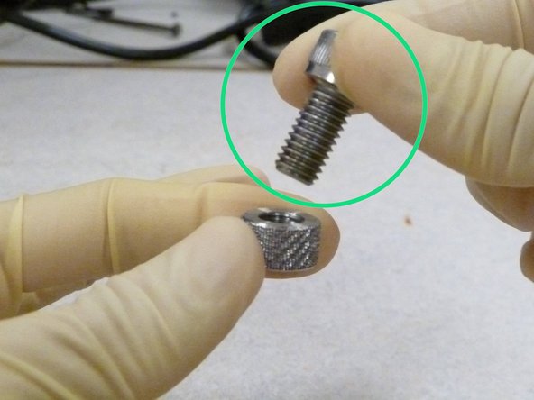 Tighten this arrangement with a size M12 bolt