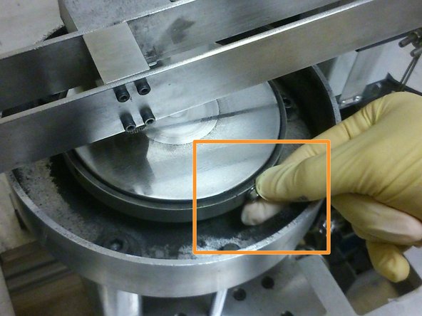 Insert the M4 screw into the aligned holes and tighten by hand