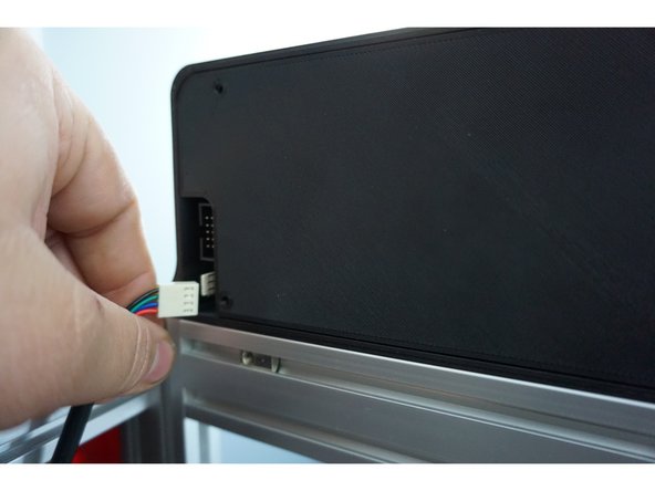 Once the screen is mounted, plug in the screen. The plug is keyed so you can only plug it in one way.