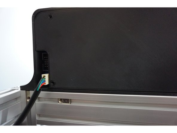 Once the screen is mounted, plug in the screen. The plug is keyed so you can only plug it in one way.