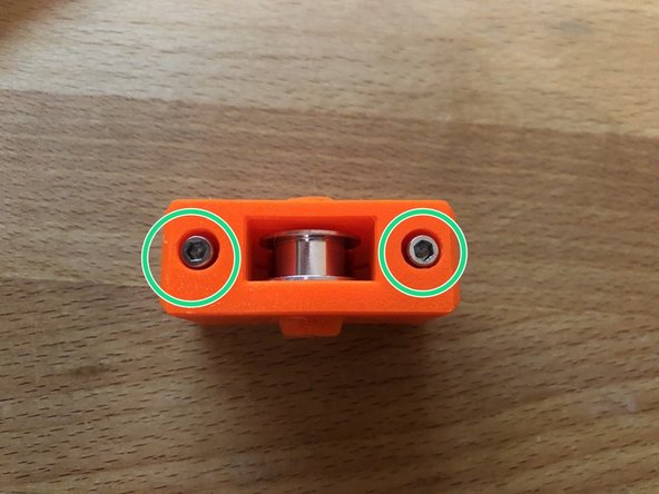 Insert 2 x M3 12mm screws into the end holes until flush with the plastic body.