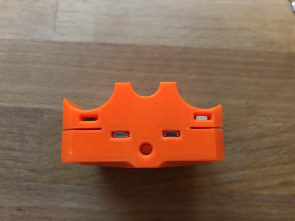 Insert 1 x M3nS into the side of the z-carriage front