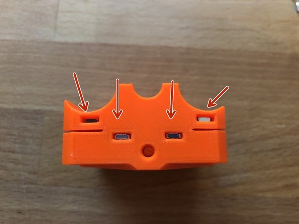 Insert 1 x M3nS into the side of the z-carriage front