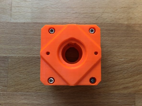 Insert 1 x M3nS into the side of the z-carriage front