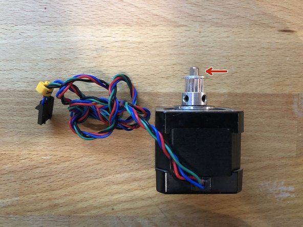 Secure the GT2-16 to the X stepper shaft, leaving 4.8mm of shaft exposed at the end.