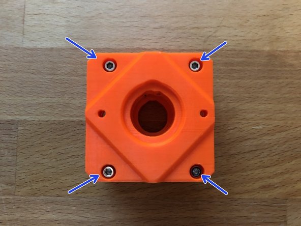 Insert 4 x M3 12mm into the front of the z-carriage-front.