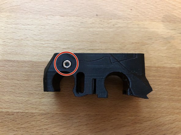 Insert M3n nut into side of X carriage