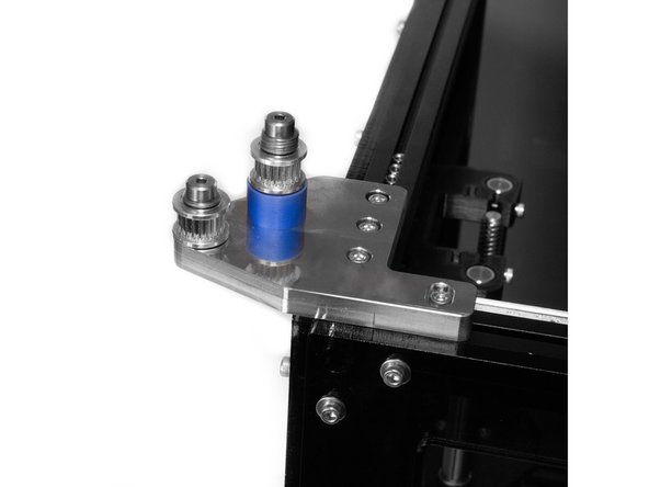 Attach the front idler mount to the left side of the top of the frame using (4) M3 x 8 socket head screws. Don't overtighten them - you'll need to be able to adjust the position of the idler mount to align the belts later.