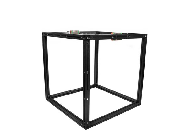 Use (4) M3 x 8mm Socket Cap Head Screws to attach the top extrusion assembly to the upright extrusions.