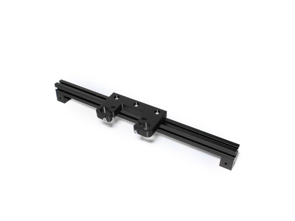 Mount (1) Z rod holders to the right extrusion by sliding the M3 nuts into the top channel. Tighten the Z rod holder to the extrusion just enough to keep them from moving freely.