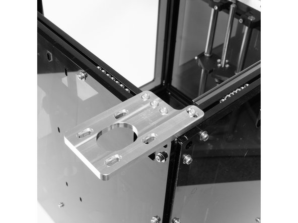 Attach the rear stepper mount to the top of the frame using (4) M3 x 8socket head screws.