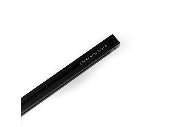 Slide (7) M3 nuts into the top channel.