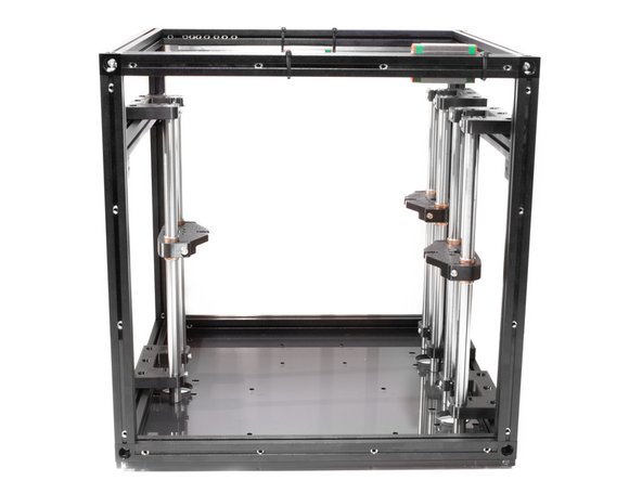 Center each of assembled Z towers over their corresponding motor mount holes in the base of the frame.