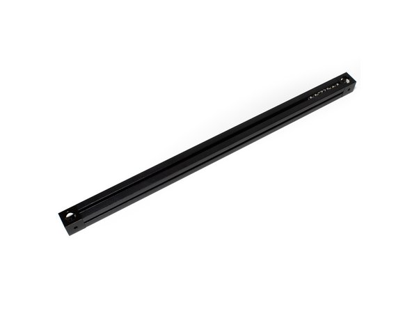 Attach the second corner cube to the top left extrusion using (1) M3 x 8mm socket cap screw. Be sure the large hole is up, small hole is down.