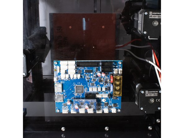 Using (4) nylon standoffs, M3 x 16 socket head screws, and M3 washers, attach the Duet to the base of the printer.