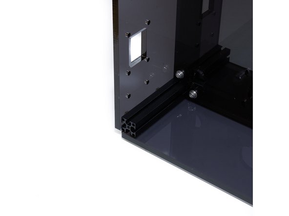 Thread (4) M3 nuts onto the screws you inserted.