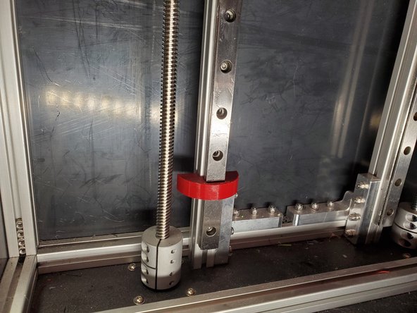 Loosen all the bolts holding your linear rail to one Z extrusion.  Adjust the Rail so it's 20mm above the bottom panel.