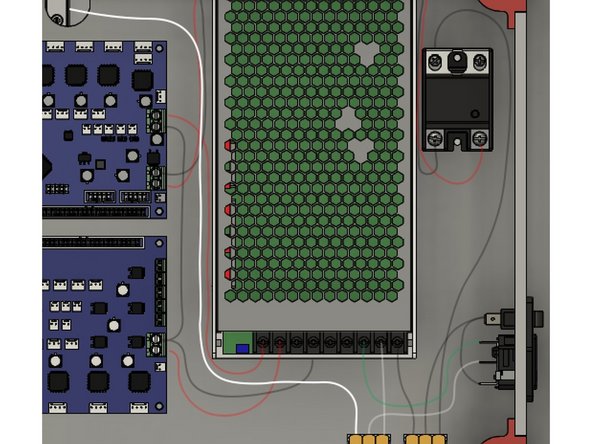 The bed has two white braided wires coming from it.  One of them is longer, and has a bare end.