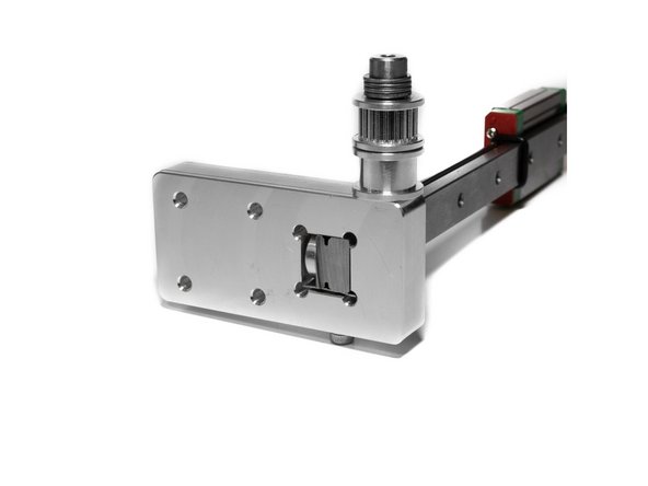 To insert the Y rail into the X carriages it gets oriented as in the image. Be sure the &quot;inside' faces with the text milled into them face each other.