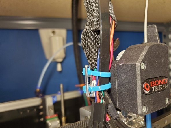 Run the ends of all the wires through the grommet you installed.