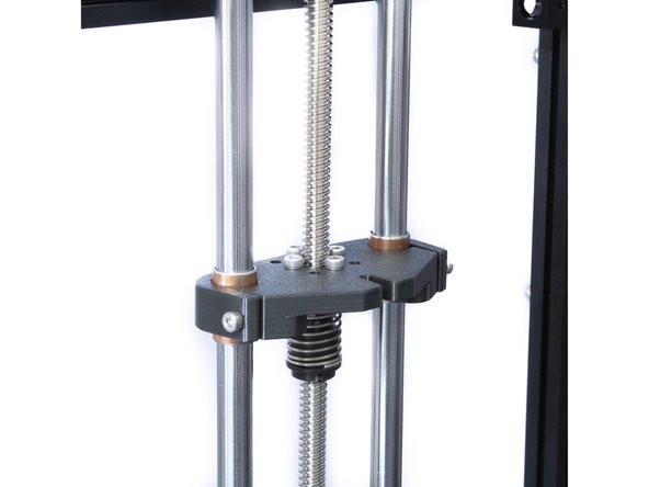 Using (4) M3 x 10 socket head screws, attach the Z Yokes to the anti-backlash nuts.