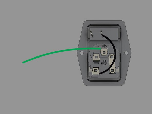 Install the 150mm green ground wire to the ground terminal on the plug. It has a spade terminal on one end, and a ring terminal on the other.