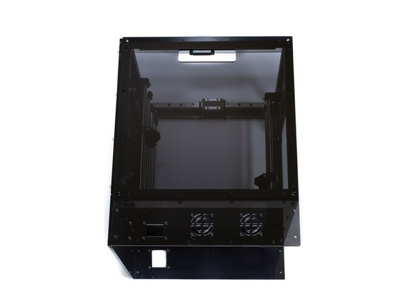 Using (16) M3 x 10 socket head screws and (16) M3 washers attach the rear acrylic panel.