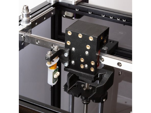Bolt the Y Carriage to the Y rail using (4) M3 x 8mm button head screws. (Socket Cap Head Screws will not work here, use button head regardless of the kit you're building).