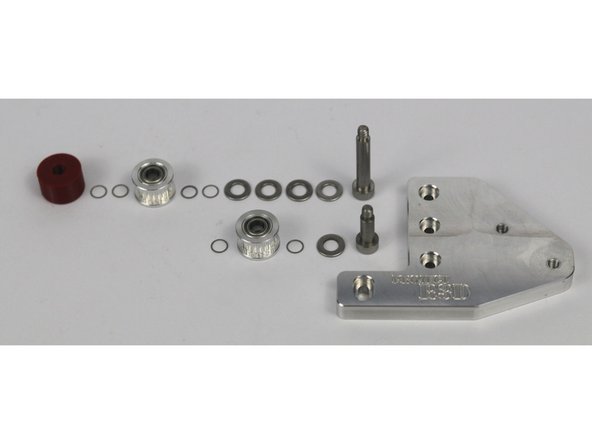 These photos can be used to validate the correct installation of the idler stacks on the front idler mount.