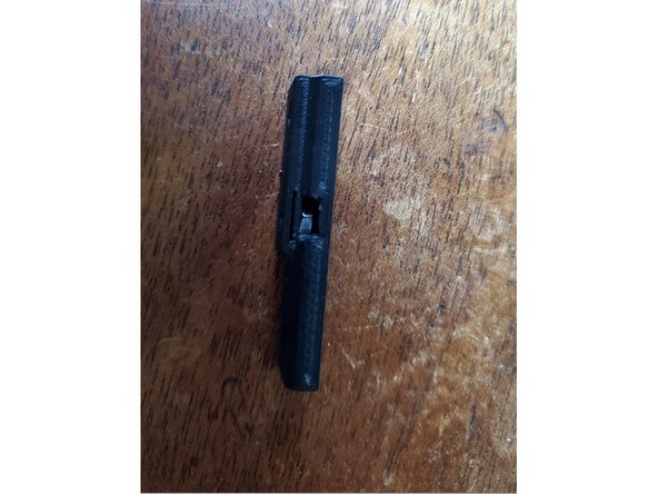 Attach the layer fan to the bottom of your Y carriage using a single M3 x 6mm button head bolt. (Image is shown off of a printer for clarity)