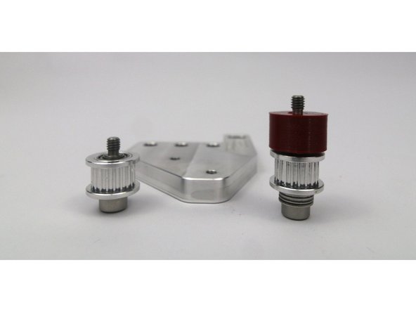 These photos can be used to validate the correct installation of the idler stacks on the front idler mount.