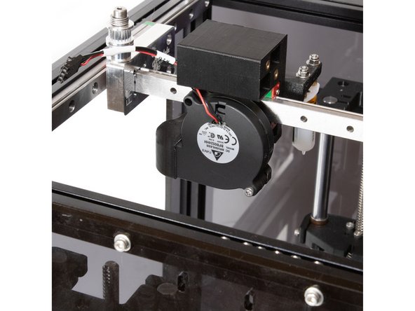 Attach the 5015 blower to the layer fan shroud using (1) M3 x 20 socket head screw.