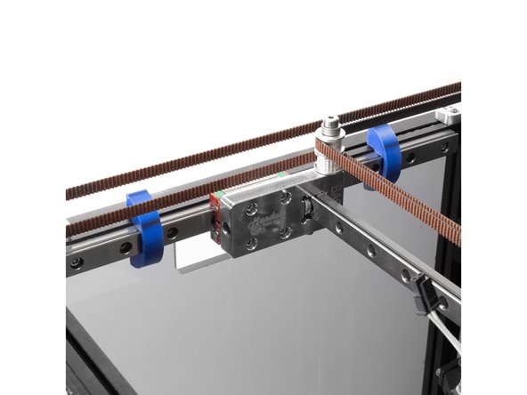 Center your X rails by loosening the retaining bolts and installing the alignment jigs on opposite sides of the rail.