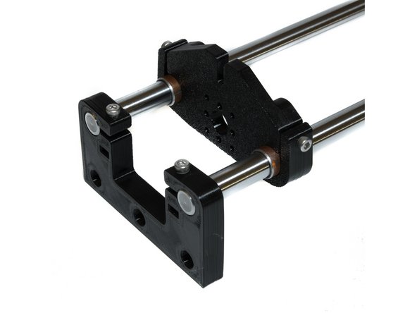 Slide the Z yoke on the smooth rods.