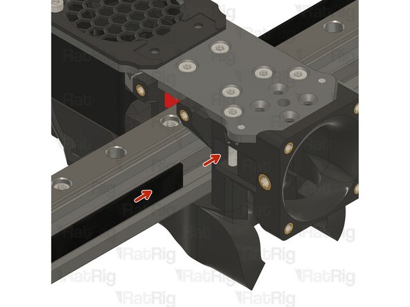 Insert the belt in the designated slot, and ensure the belt end is fed from behind the screw.