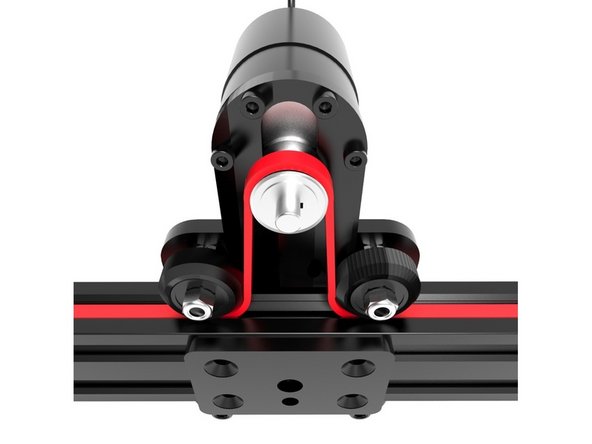 Carefully loop the Belt around the toothed pulley of the motor, keeping tension.
