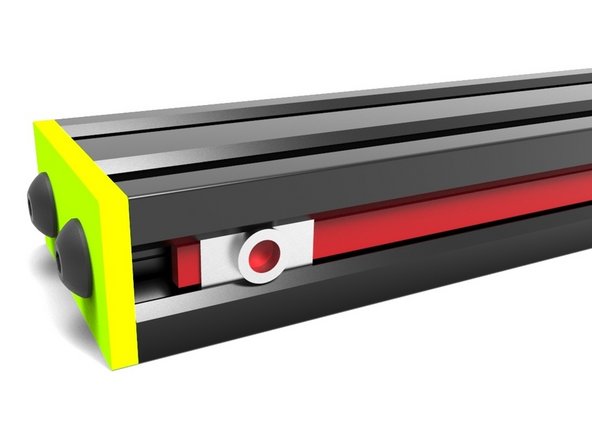 Slide one tip of the Belt behind one of the T-Nuts, making sure the T-Nut is close to the end of the rail. The toothed side of the Belt should be facing inwards(touching the rail).